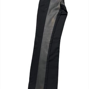 Black jeans with vegan leather patchwork and rinestones